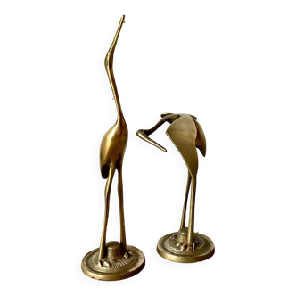 Couple of brass herons
