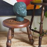 Low tripod stool in vintage turned solid wood
