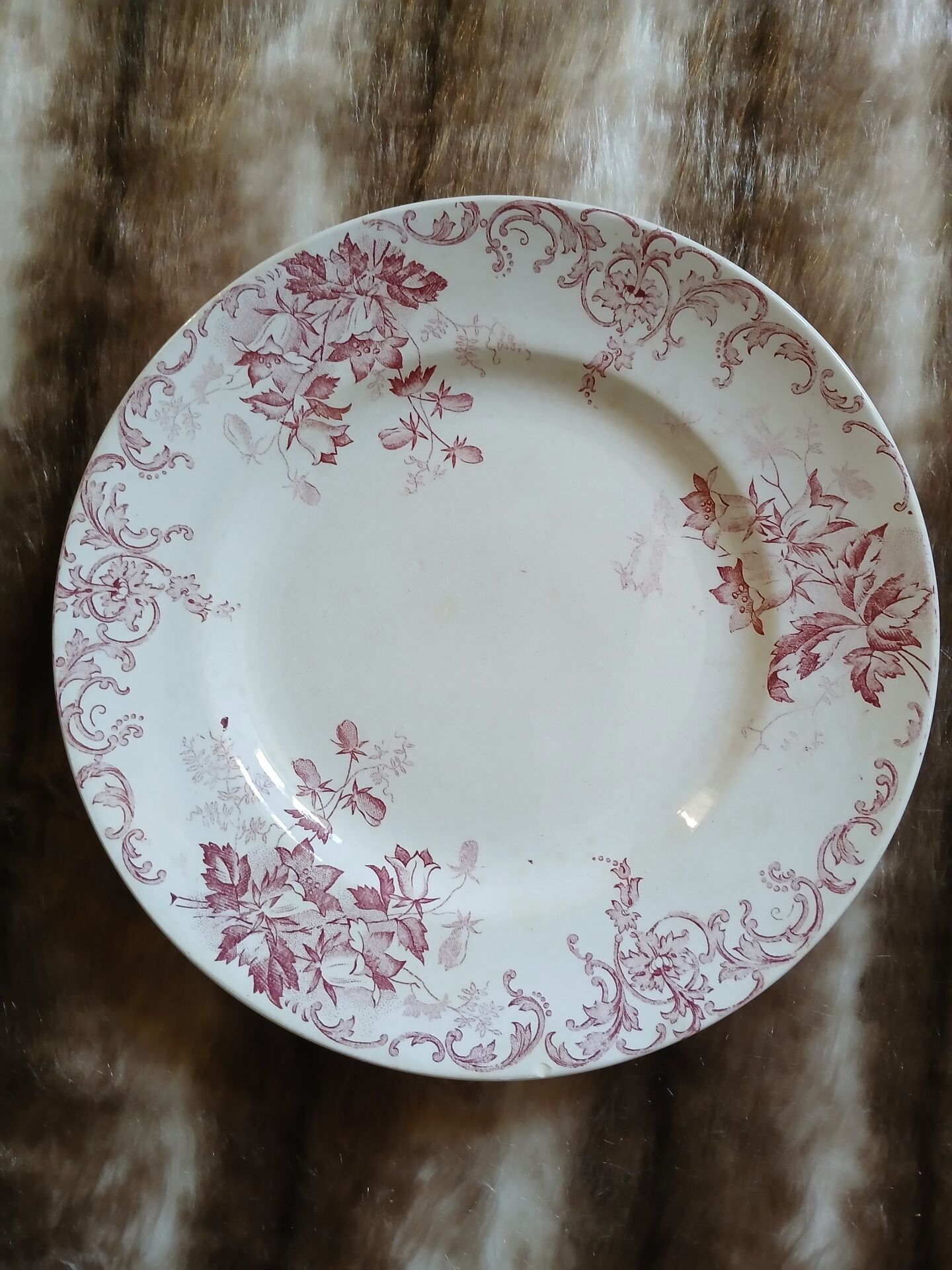 13 mismatched flat plates in ironstone