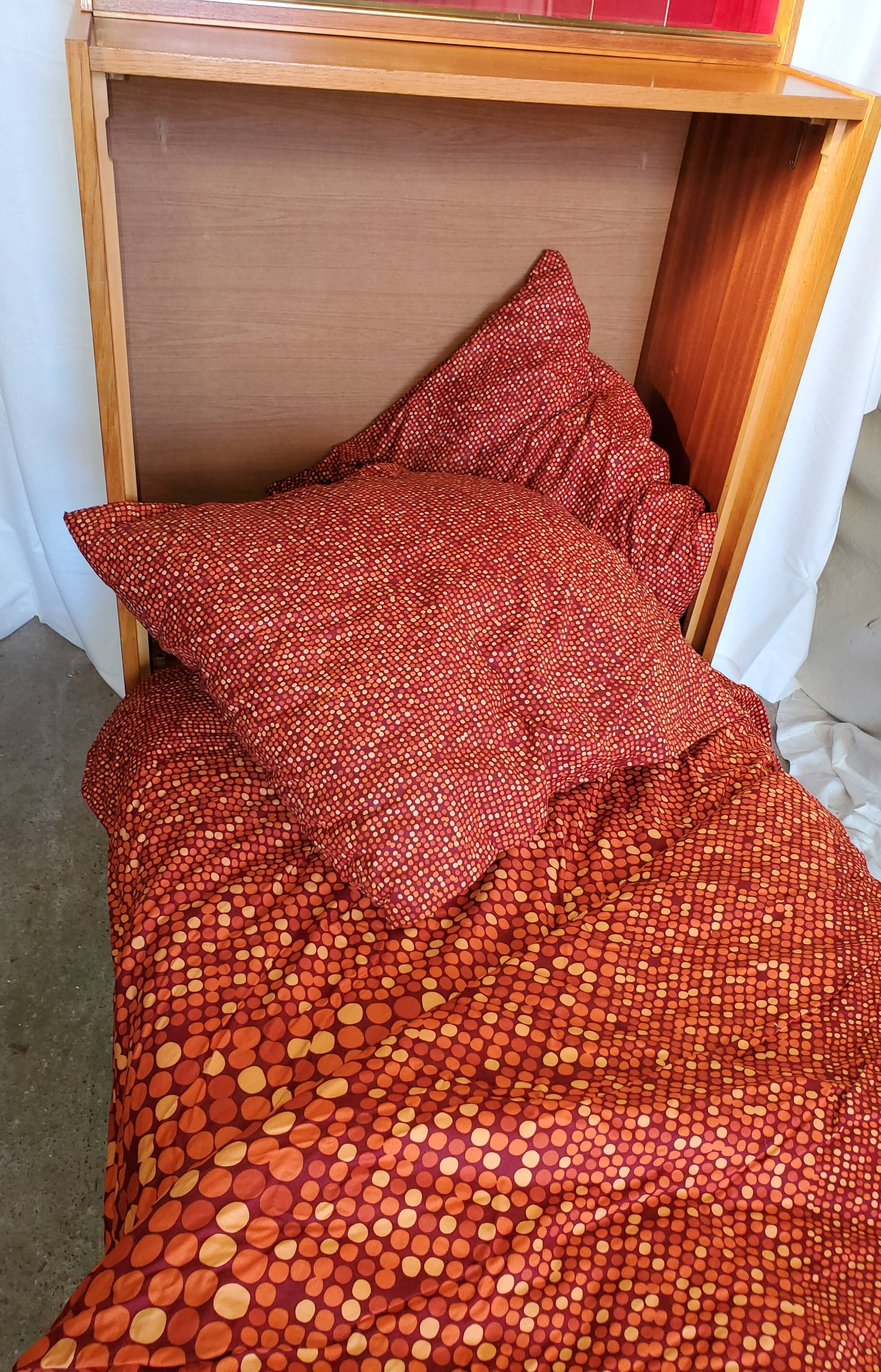 Fold bed in a 60's cabinet