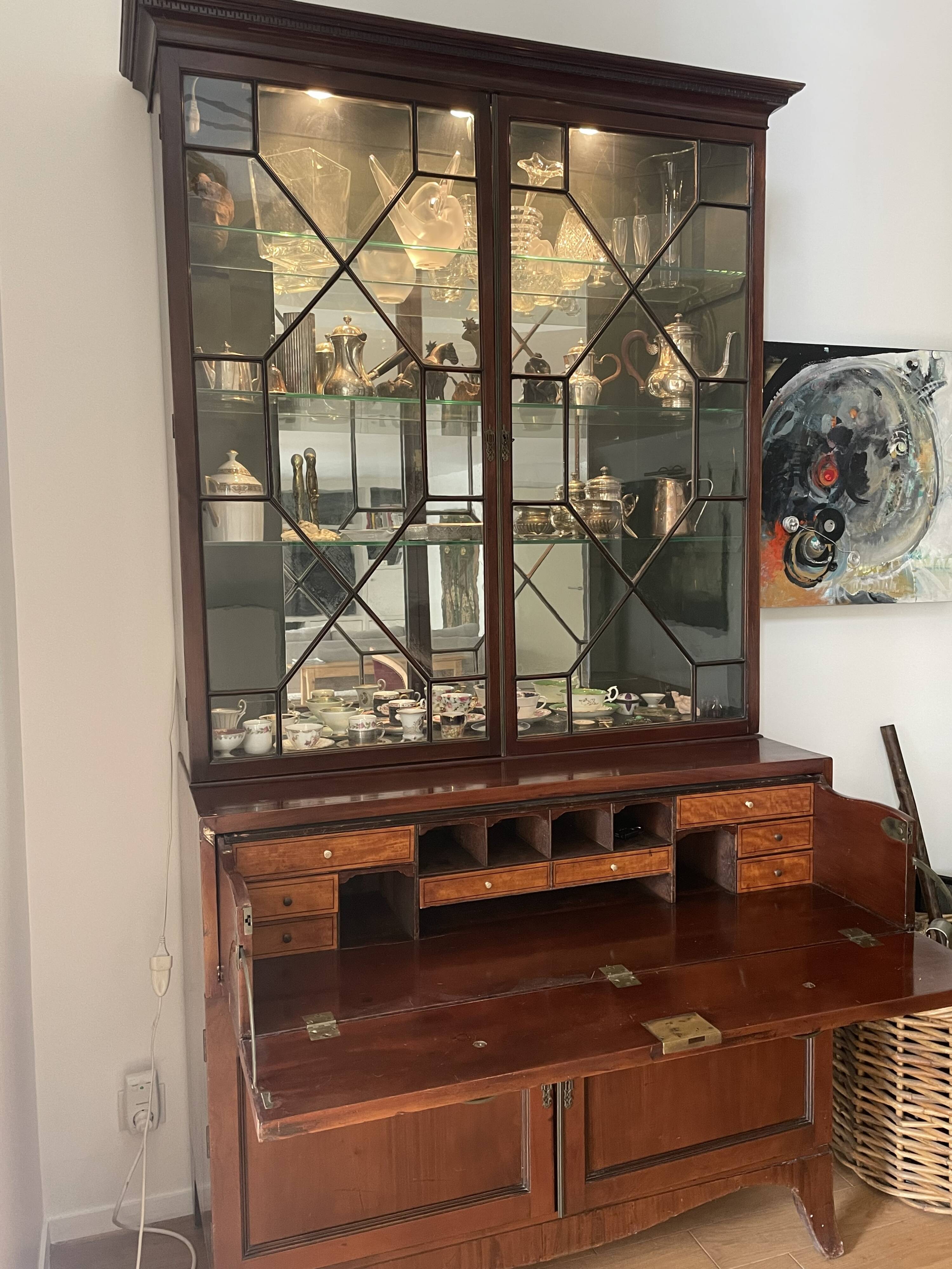 Library with English mahogany secretary.