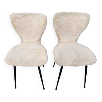 Pair of white moumoute chairs