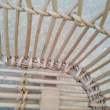 Rattan cradle for doll on vintage wheels