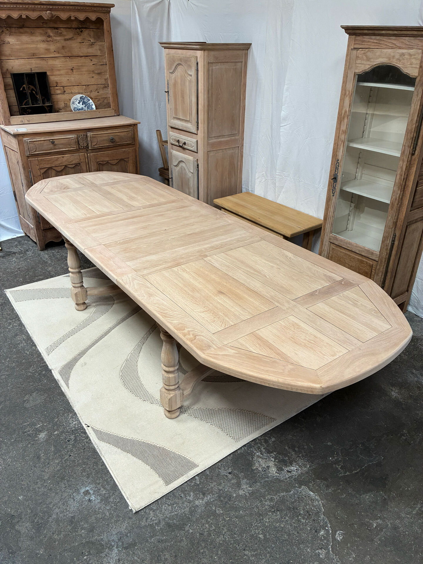 Solid oak farmhouse table with extensions.