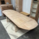 Solid oak farmhouse table with extensions.