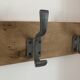 Three-hooked patères on blond oak from a local school in the 50s/60s