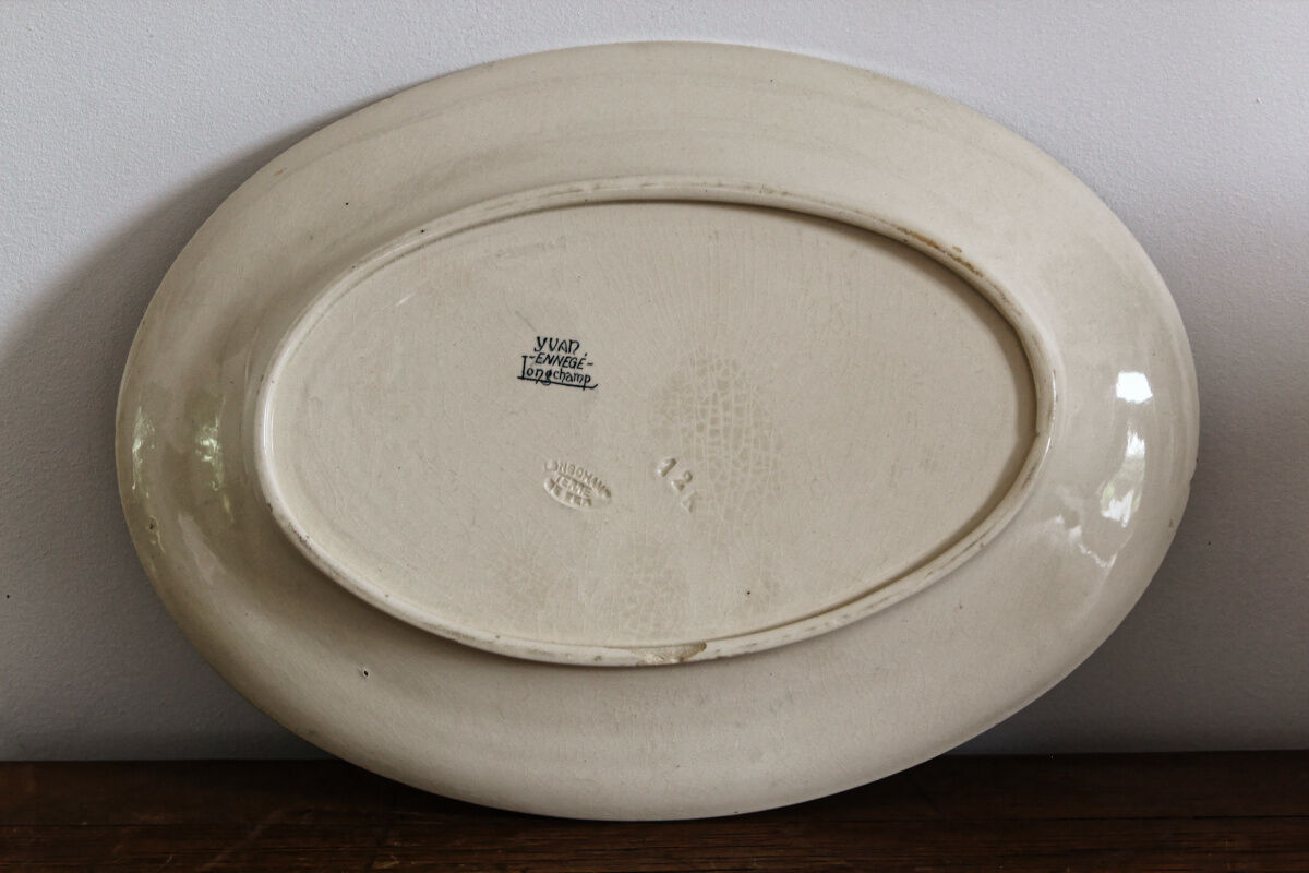 Pair of longchamp earthenware dishes, iron earth,
