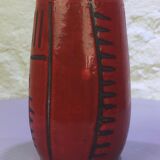 Red ceramic vase with free patterns