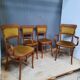 Pair of armchair and chair in curved wood