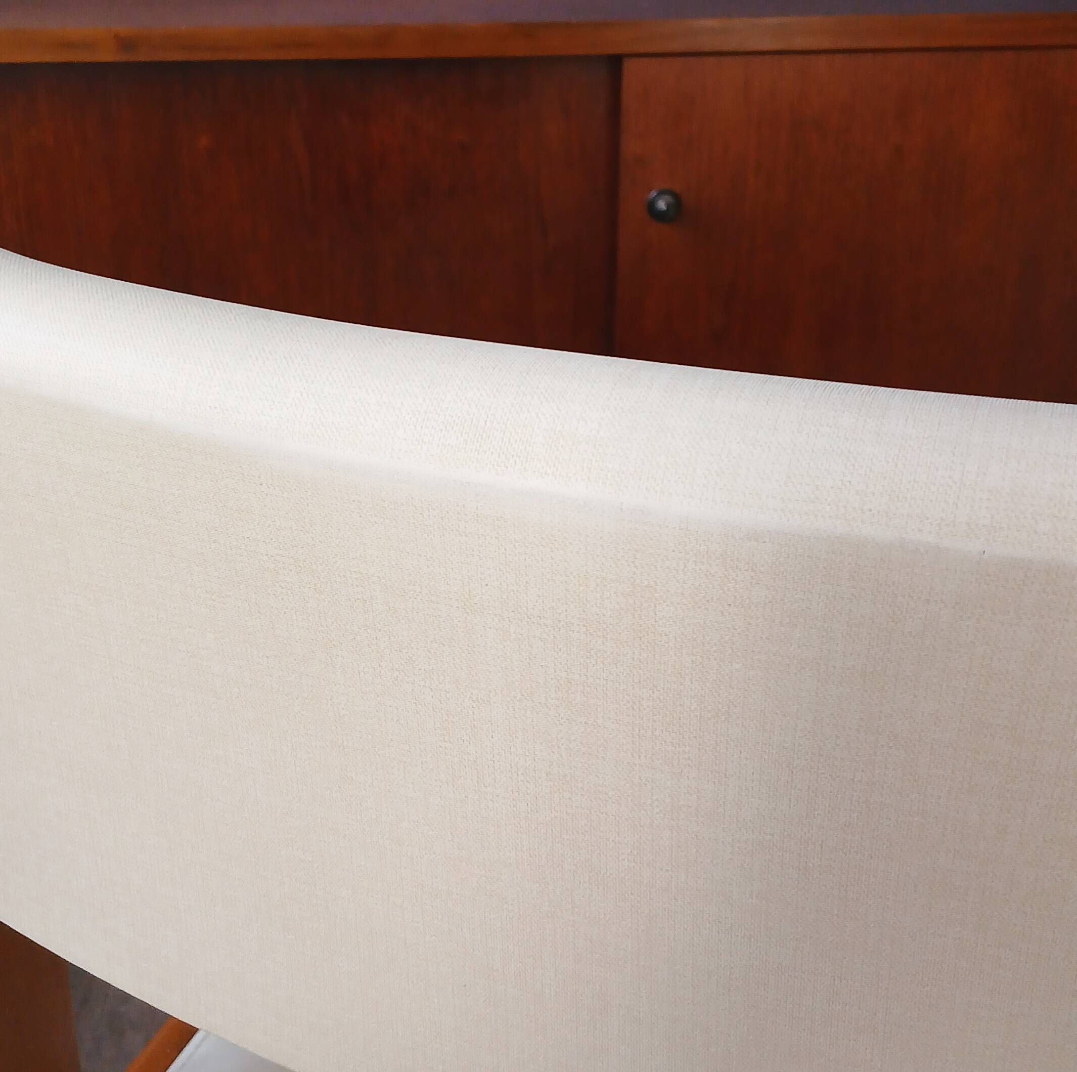 Armchair by André Sornay, stained solid beech & beige faux leather. 1980