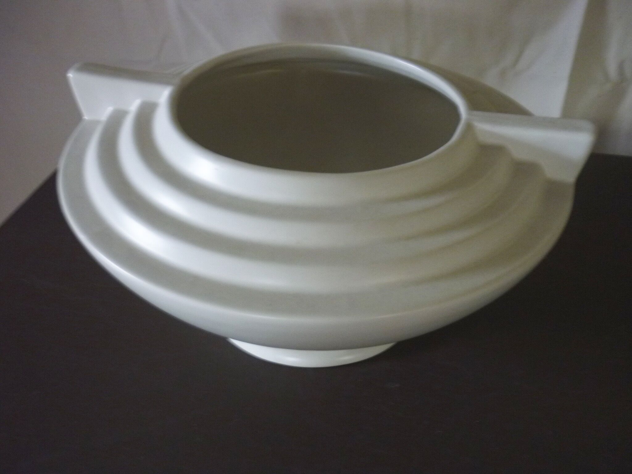 Beige ceramic vase What's