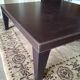 Leather-covered coffee table Roche Bobois
