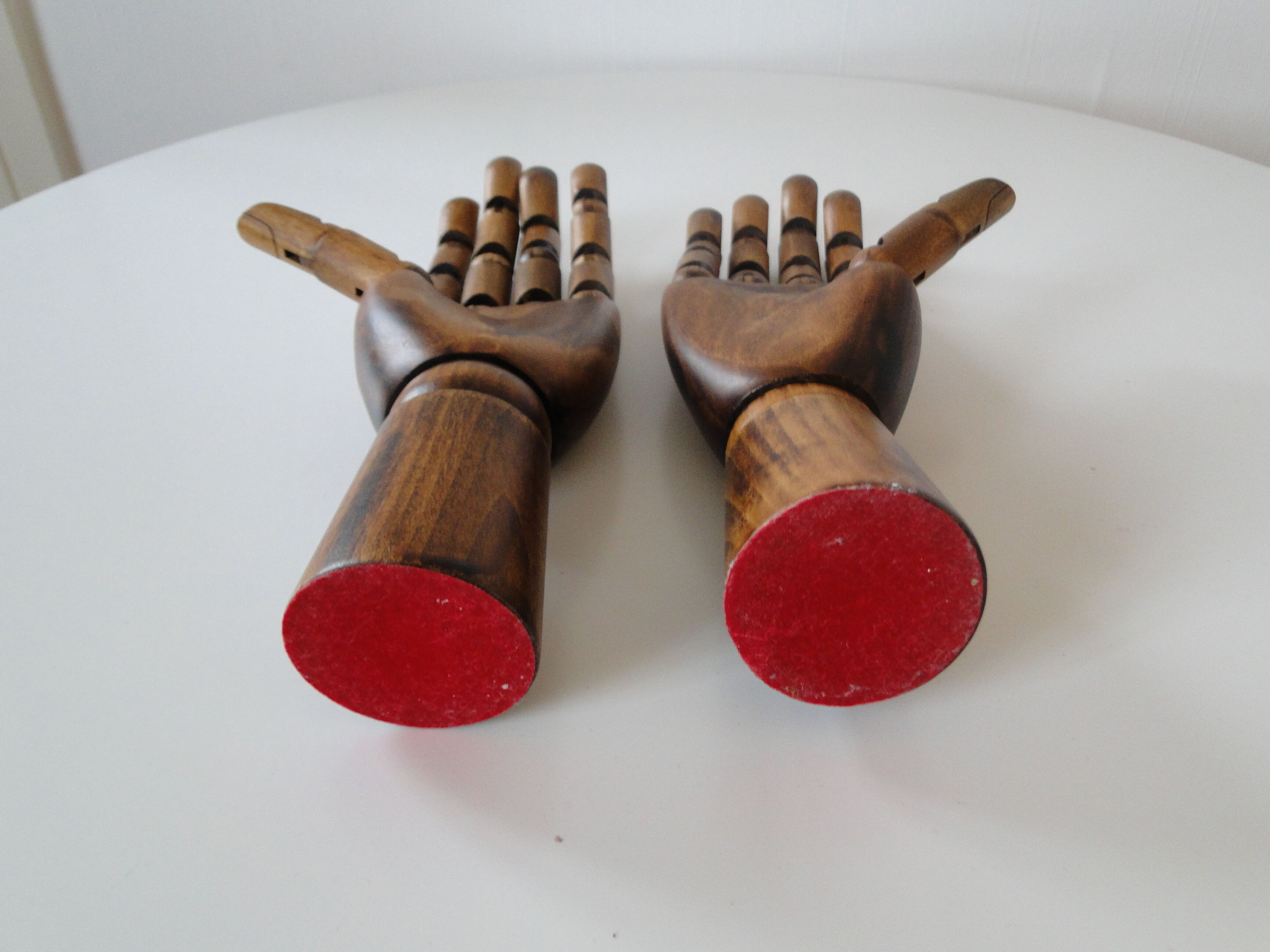 Pair of articulated wooden hands