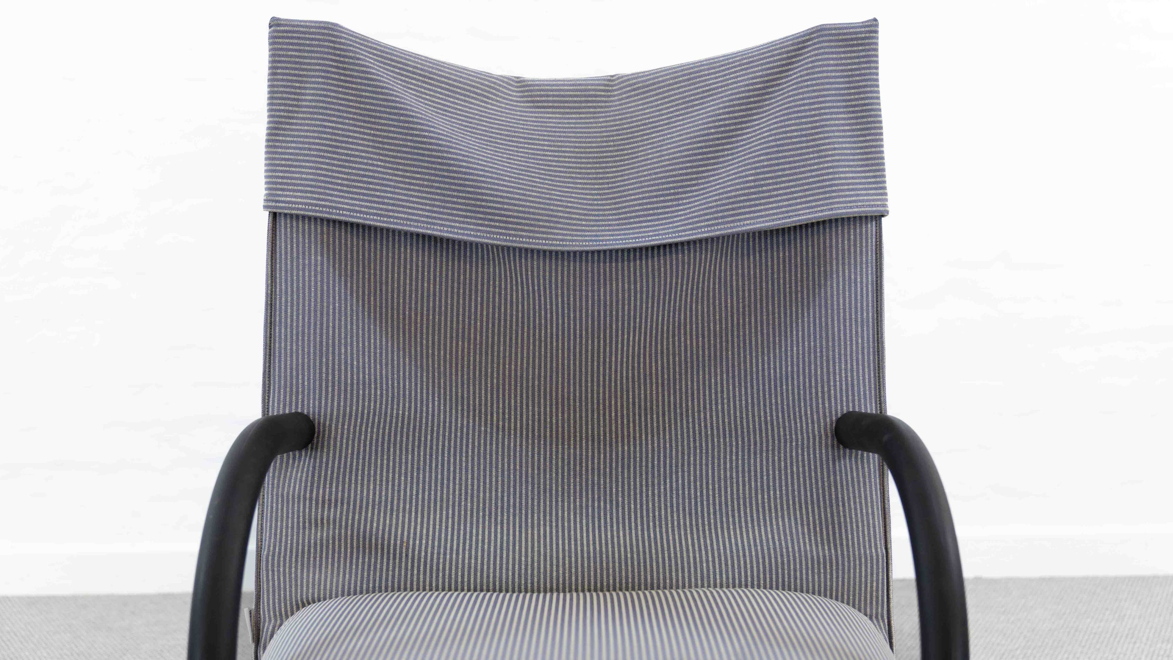 Zen easy chair with footrest by claude brisson for ligne roset