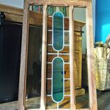 Stained glass window with framing