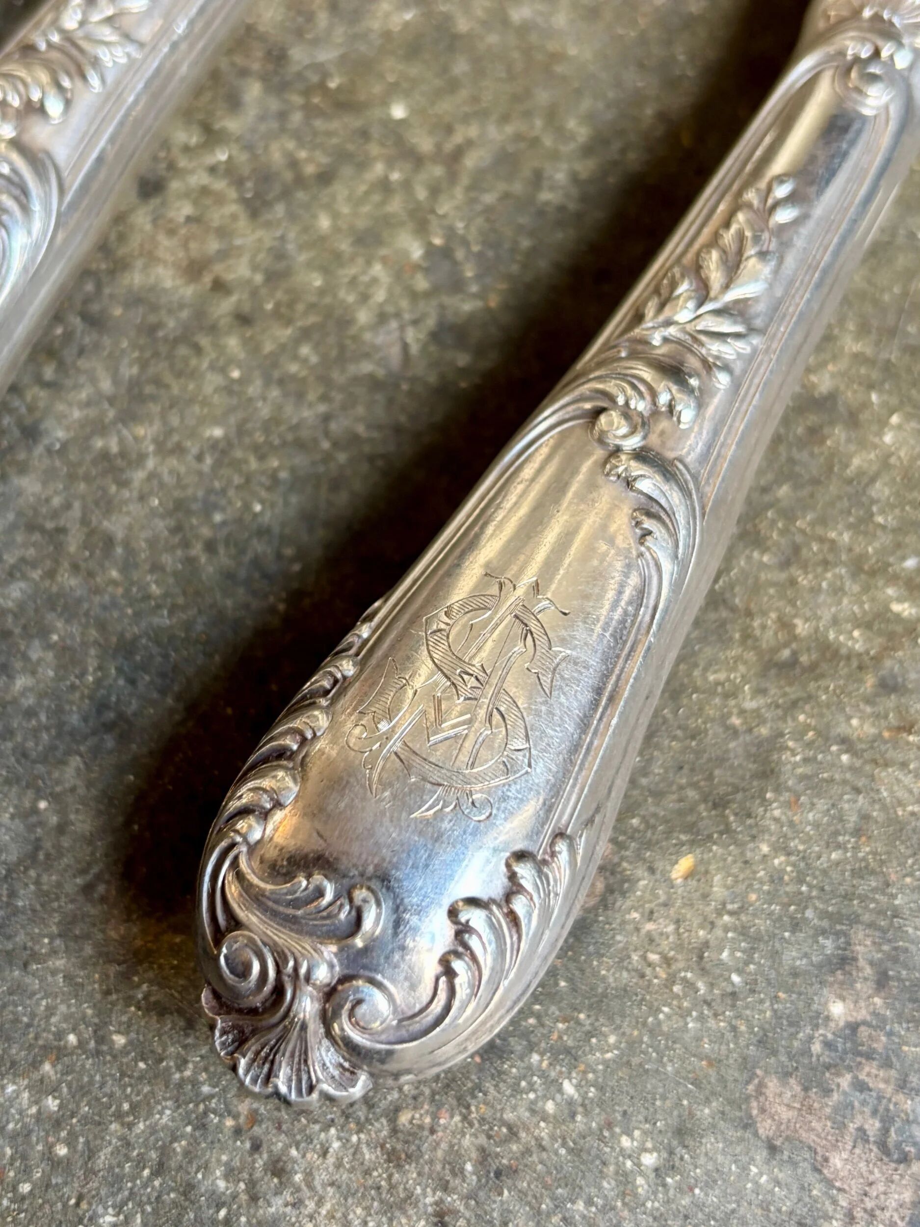 2 silver openwork service cutlery sets engraved with "AS"