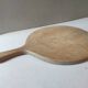 Old round pizza cutting board