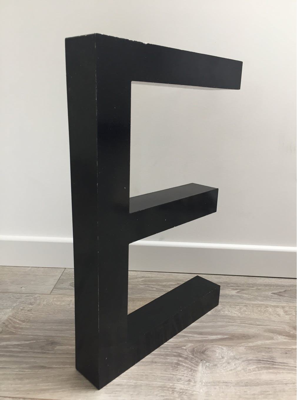 E metal letter