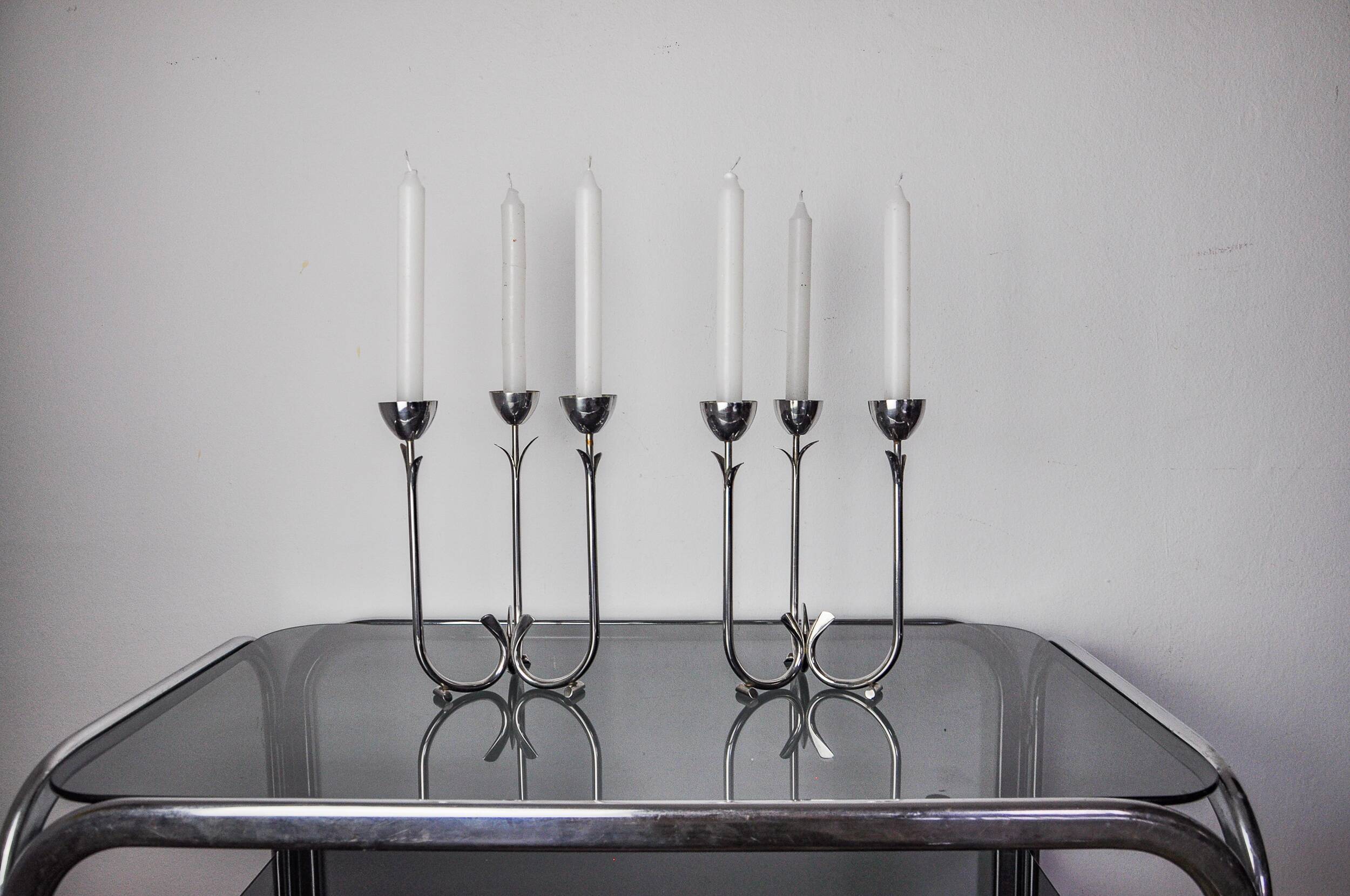 Pair of art deco stainless steel 3-flame candlesticks, Spain, 1970