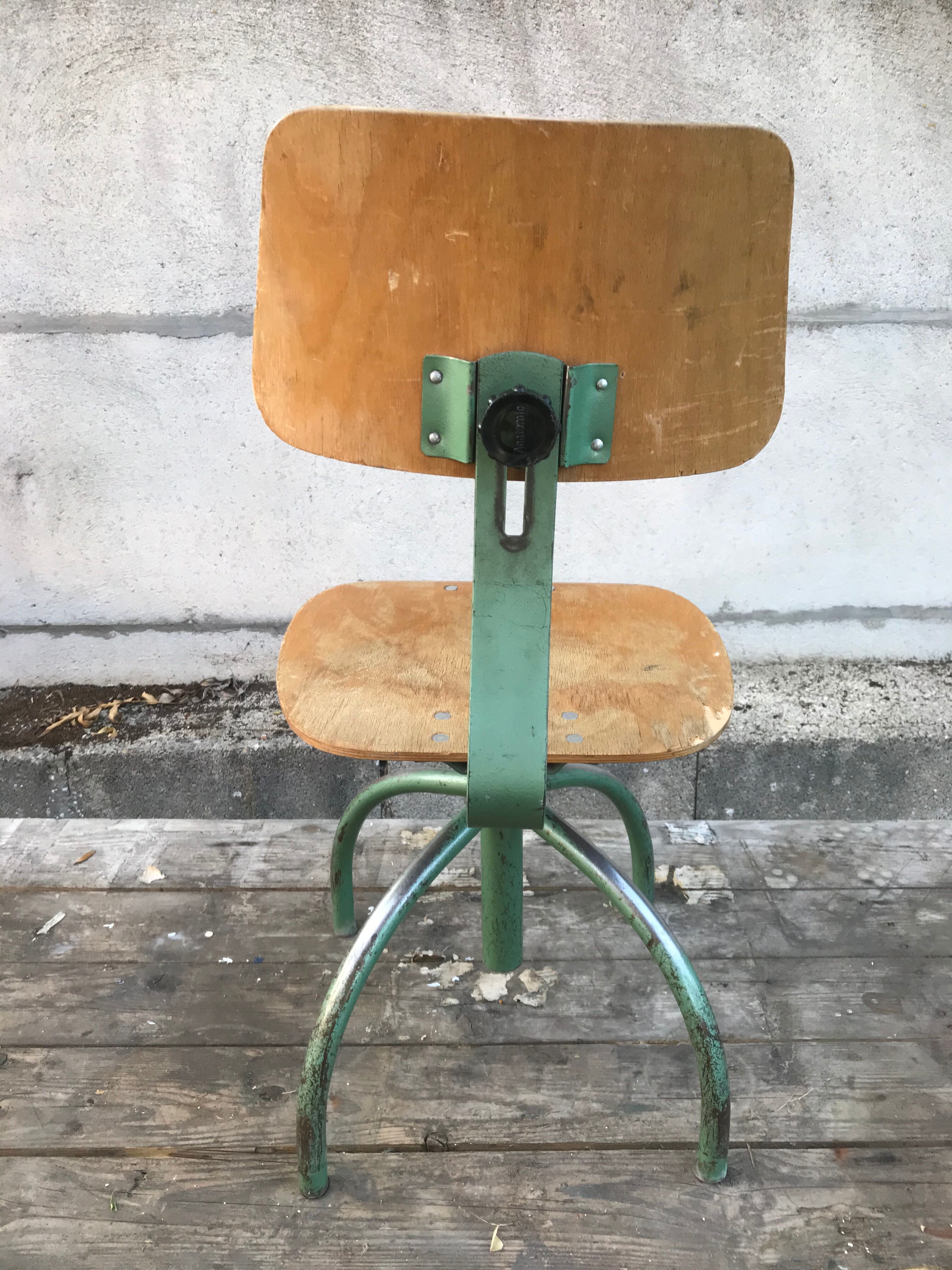 Former green metal workshop chair