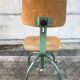 Former green metal workshop chair