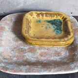 Set of three potter's plates in enamelled earth