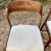 Four vintage Baumann sled chairs from the 1960s 1970s.