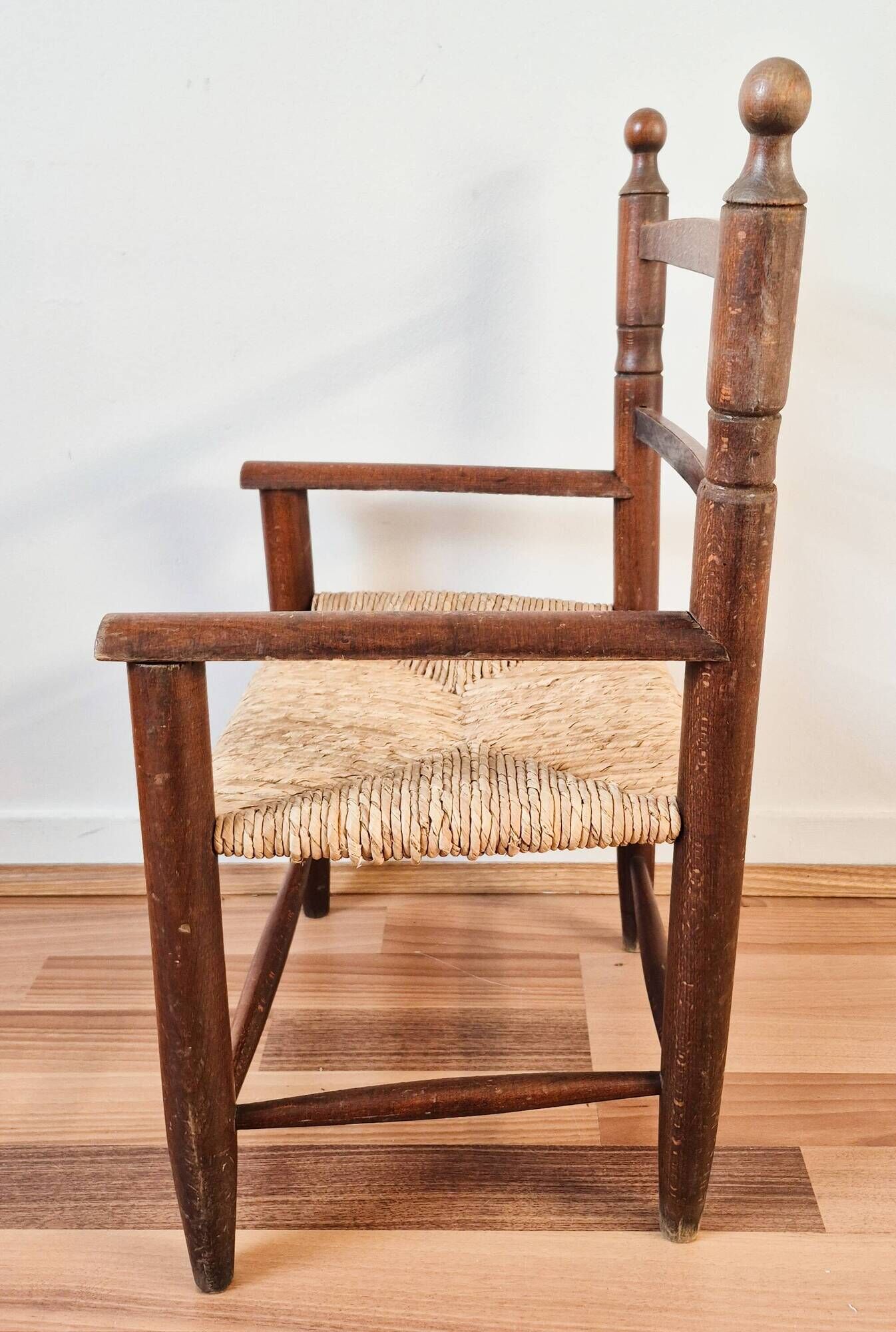 Vintage wooden and straw children's armchair, 1950s.