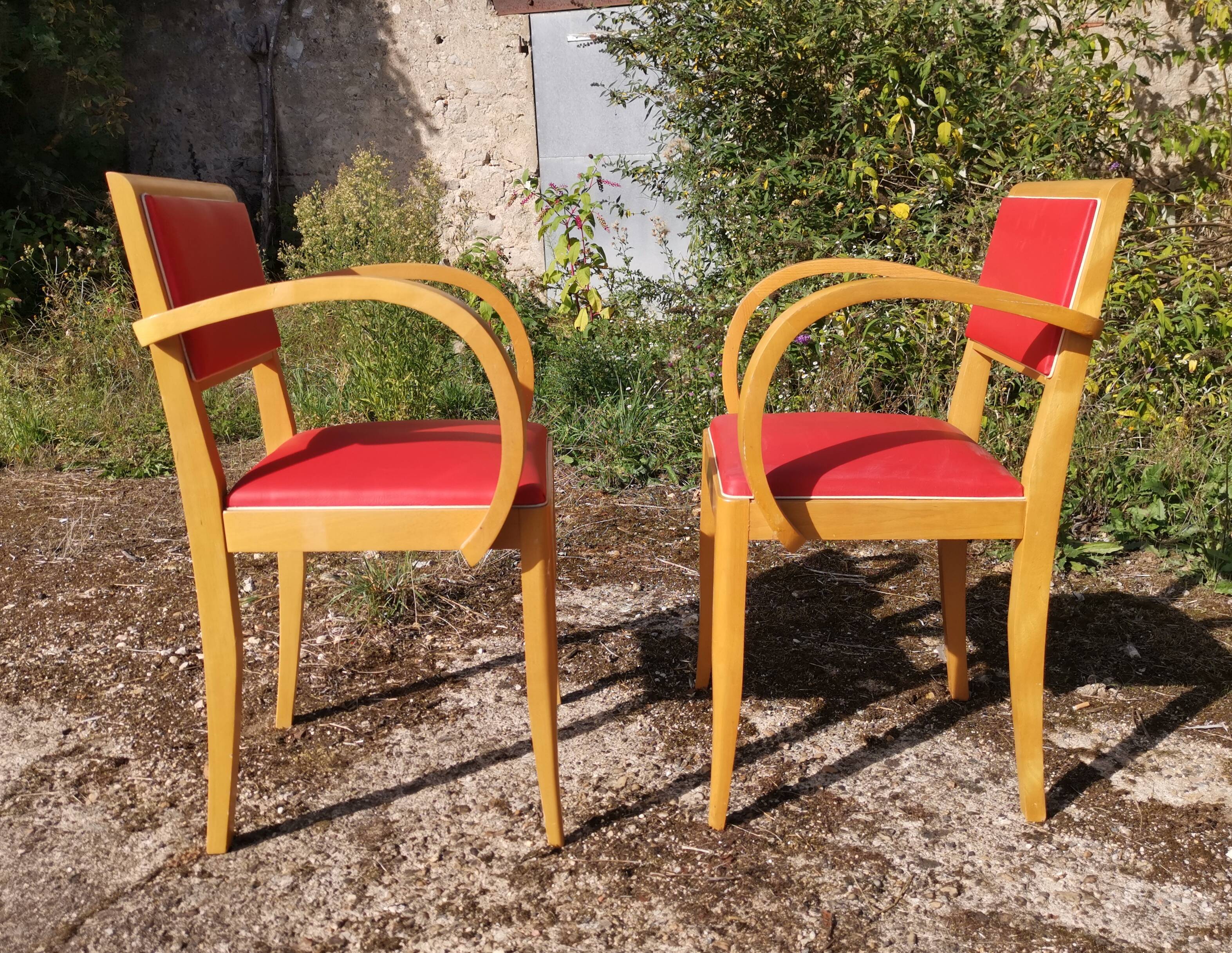 Paire de fauteuil bridge en Skaï rouge