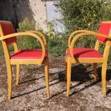 Pair of bridge armchairs in red Skaï