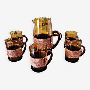 Orangeade service with pitcher and 6 amber glass glasses with "braided" fabric surround