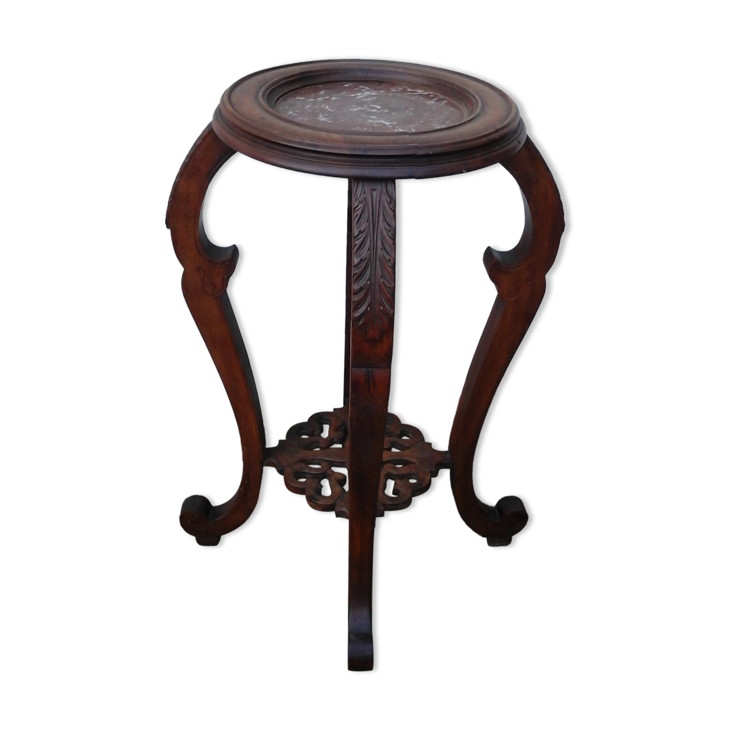 Wooden pedestal table with marble top