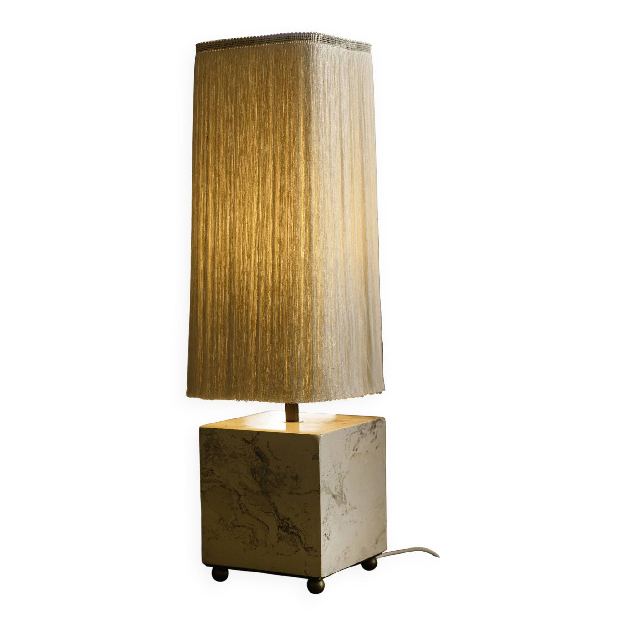 Beige marble stucco base, Houles white ecru fringed lampshade.