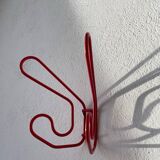 Pair of red metal wall hooks