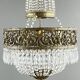 Empire-style chandelier in bronze with crystal pendants, early 20th century.