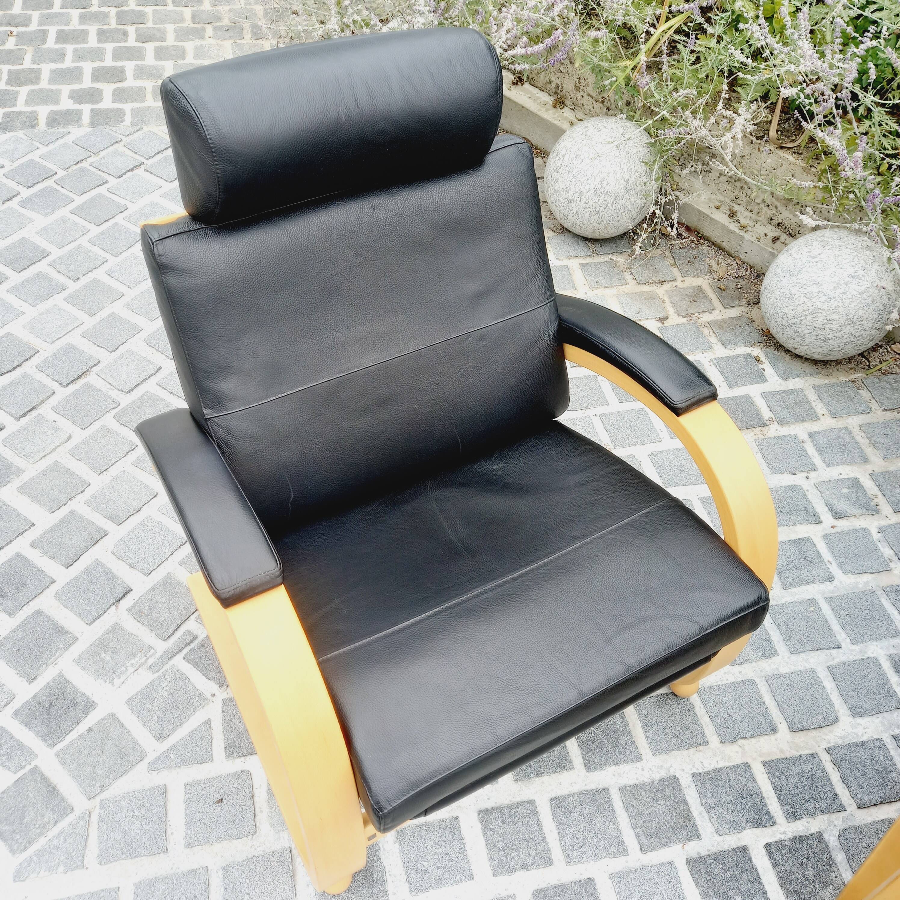 Pair of NELO Scandinavian armchairs