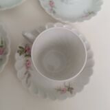 Haviland Limoges porcelain 10 coffee cups and 9 saucers with floral decoration.