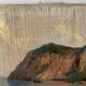 Village in the cliffs, oil on canvas signed E. Bello