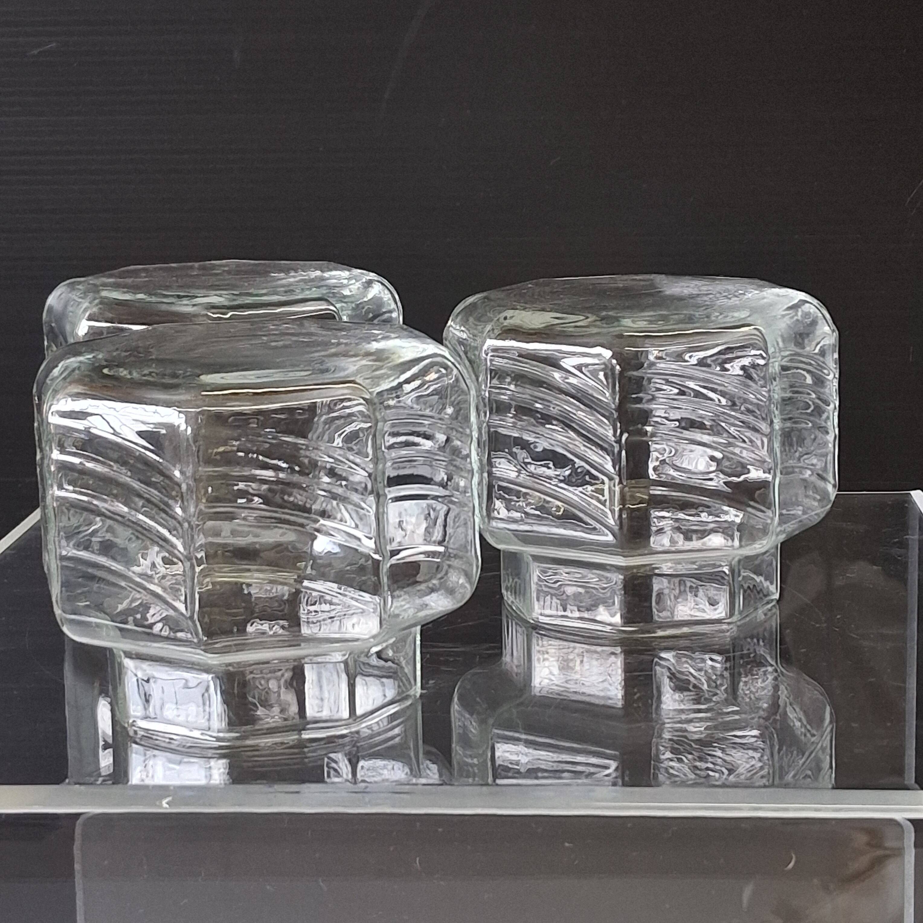 Set of 3 glass jars with old transparent lids in very good condition.