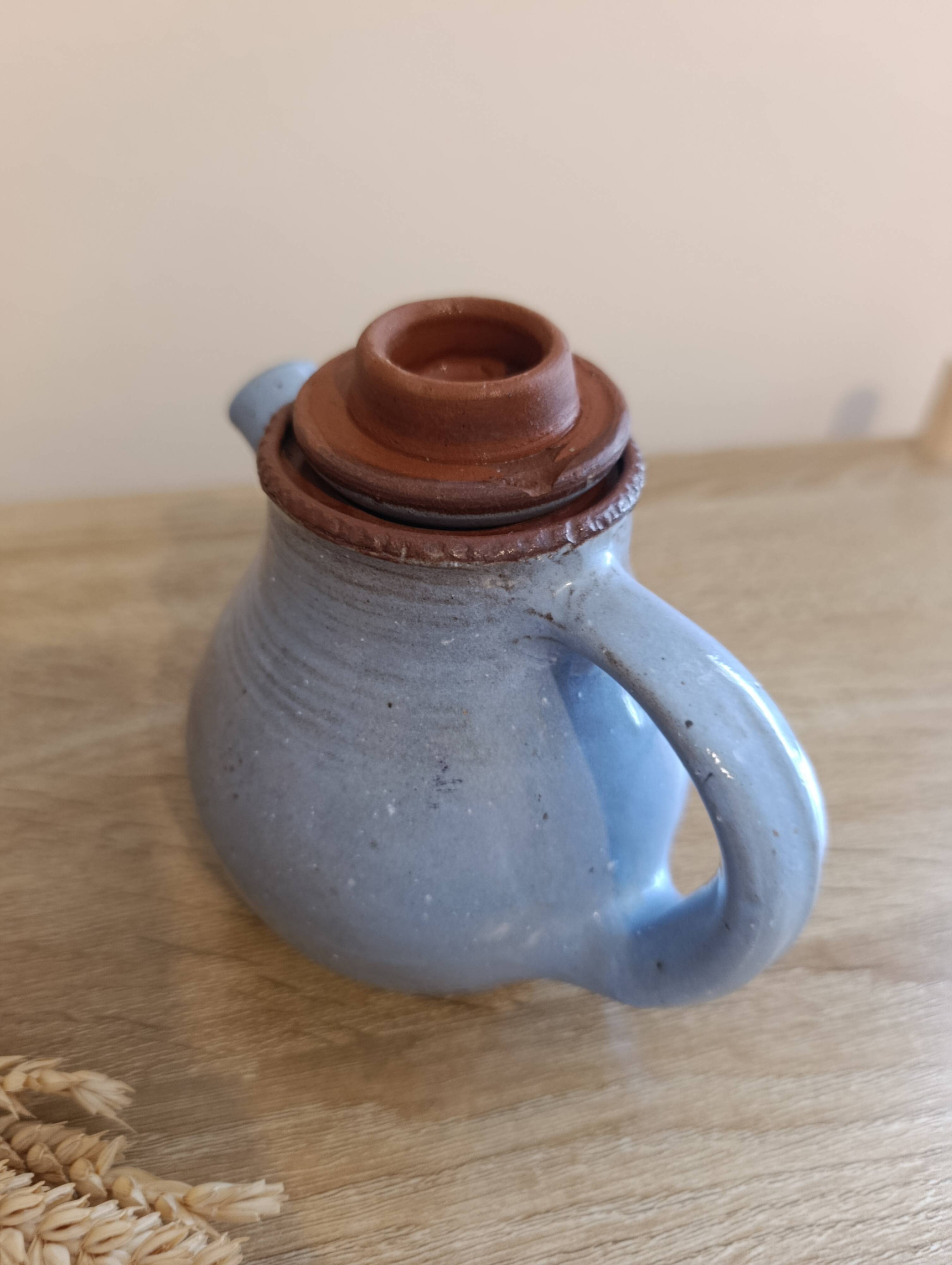 Ceramic teapot in blue/grey glaze, signed by Jeanne and Norbert Pierlot.