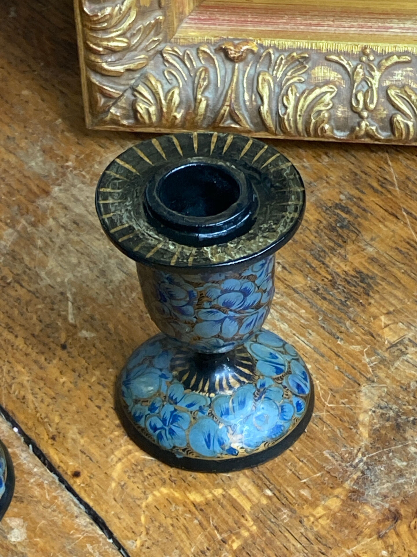 Pair of Kashmiri candlesticks, lacquered papier-mâché