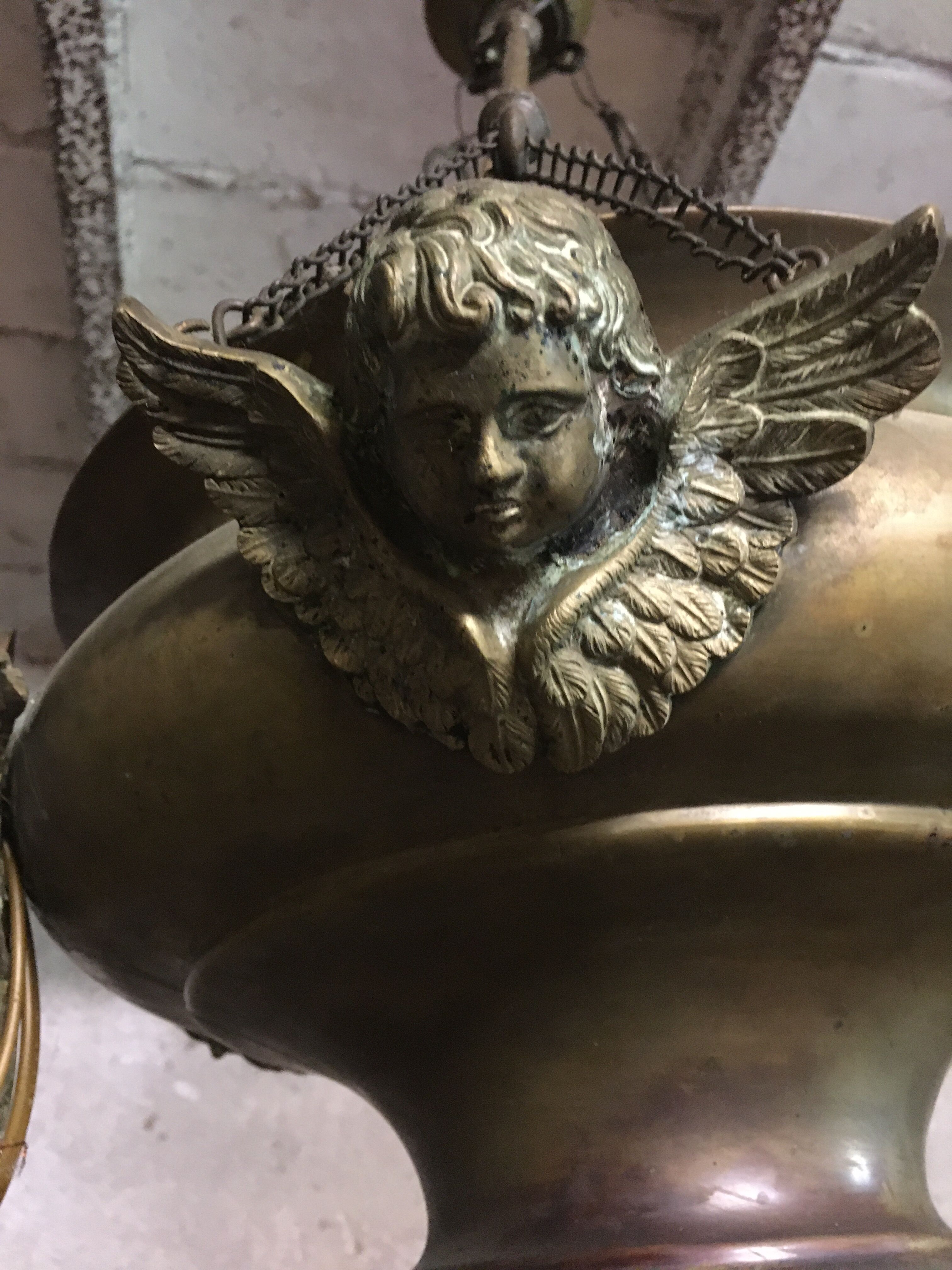 Brass chandelier with angels