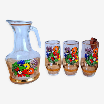 Set of 3 glasses and its pitcher with seventies flowers