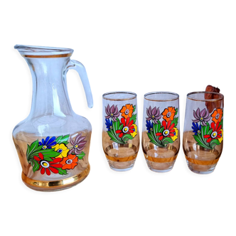 Set of 3 glasses and its pitcher with seventies flowers