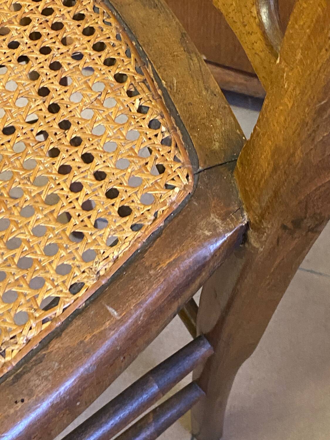 Antique wooden chair, cane seat