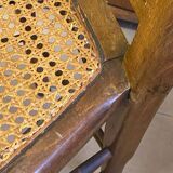Antique wooden chair, cane seat