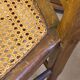 Antique wooden chair, cane seat