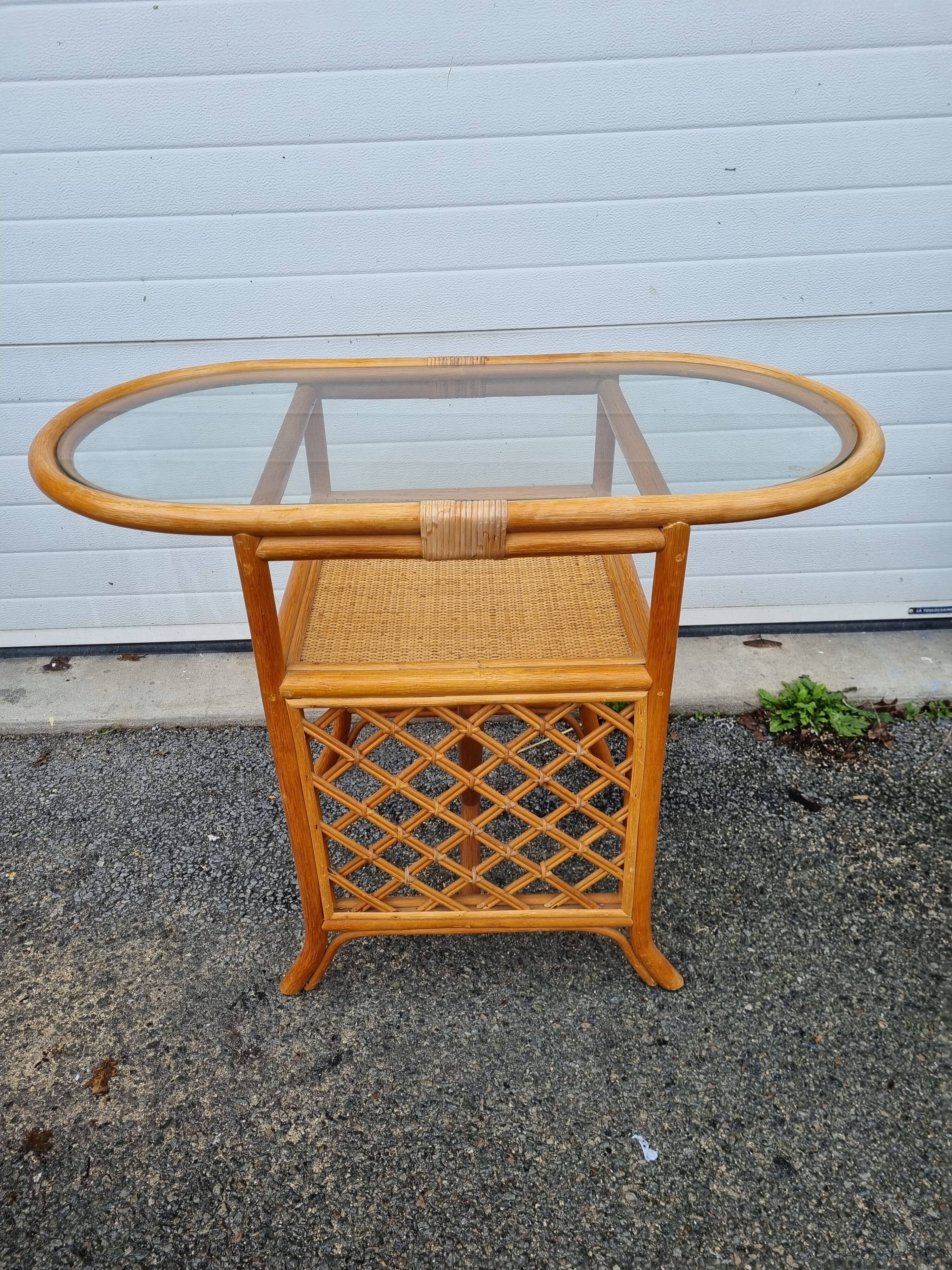 Rattan table and 2 armchairs