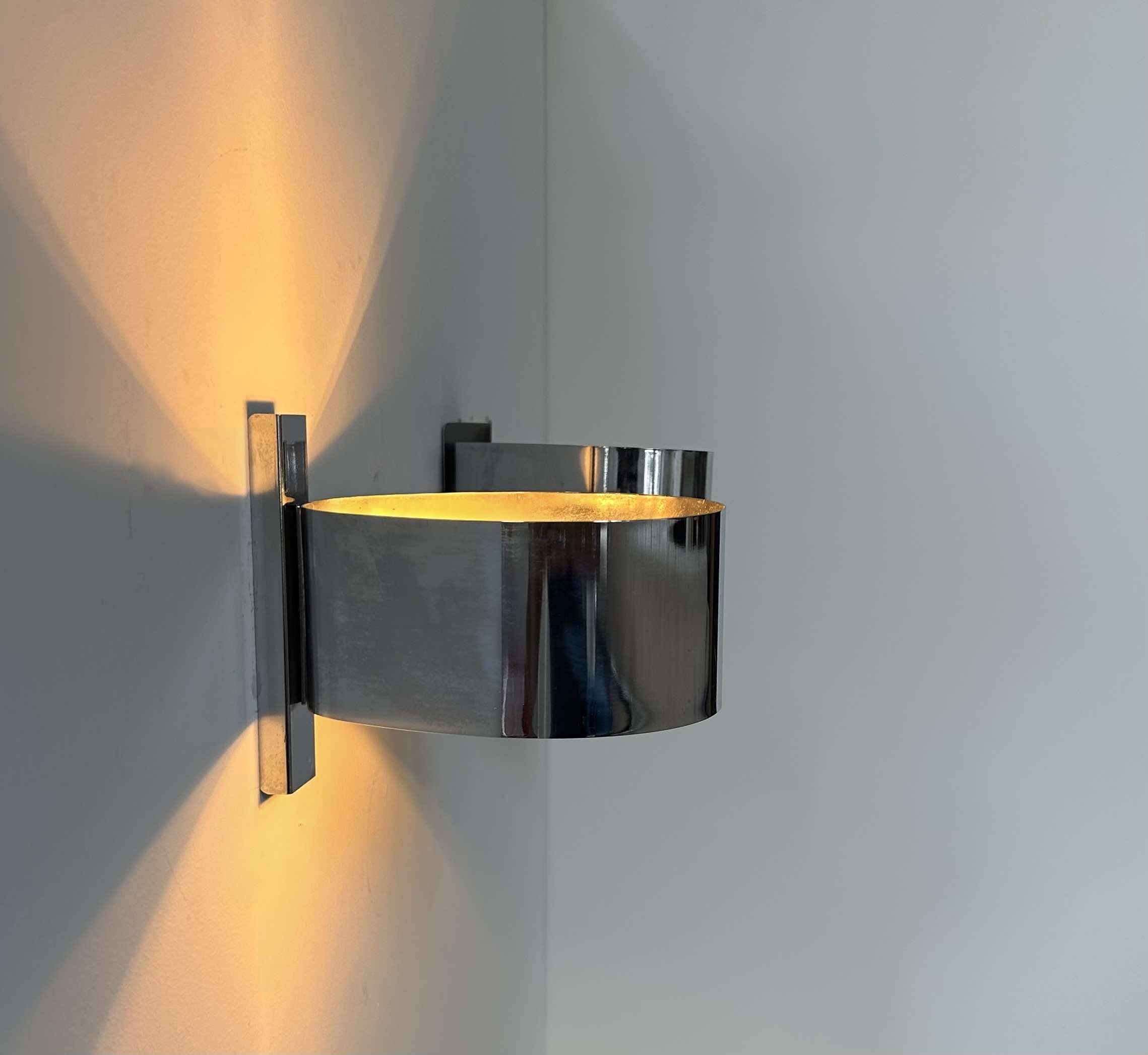 Pair of vintage wall lights, curved chrome metal, France 1970