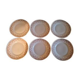 Série de six assiettes à dessert en porcelaine U.C Limoges, début XXème